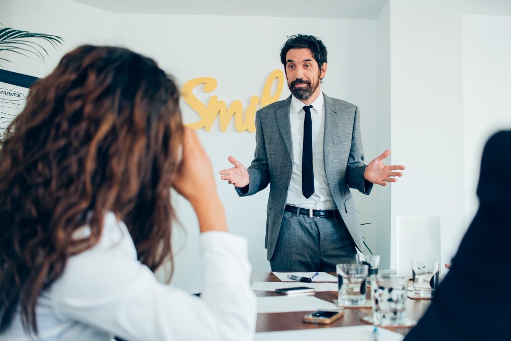 Businessman presenting in a meeting to colleagues in an office